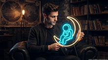 Load image into Gallery viewer, Astronaut on Moon Neon Sign, Sitting Spaceman Neon Sign warm white