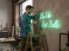 Load image into Gallery viewer, La Vie Est Belle Neon Sign — Romantic French LED Wall Decor for Bedroom &amp; Living Room
