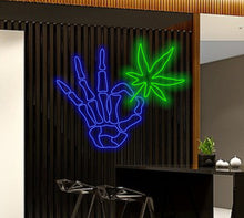 Load image into Gallery viewer, skeleton arm with cannabis neon sign
