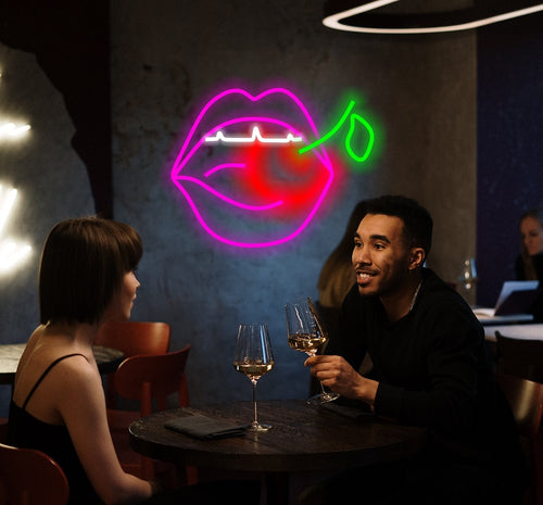 neon sign lips with cherry
