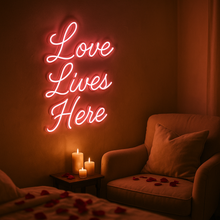 Load image into Gallery viewer, Love lives here Neon Sign – Boho Spiritual Neon Light for Bedroom, Dorm or Bohemian Wall Decor
