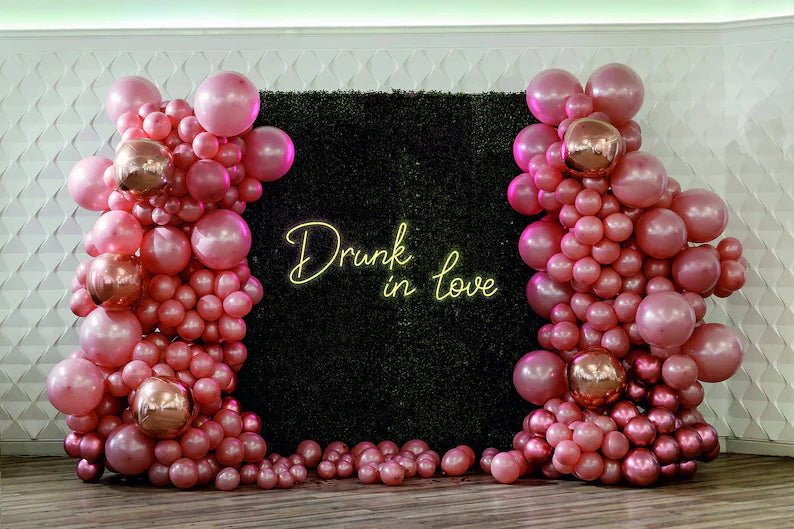 Drunk in LOVE LED Neon Light Sign for Weddings, Bars & Home Decor shown on bar van at an event  - from oohneon.com