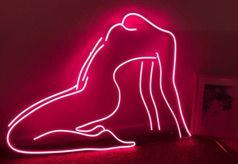 Neon sign a beautiful woman's body