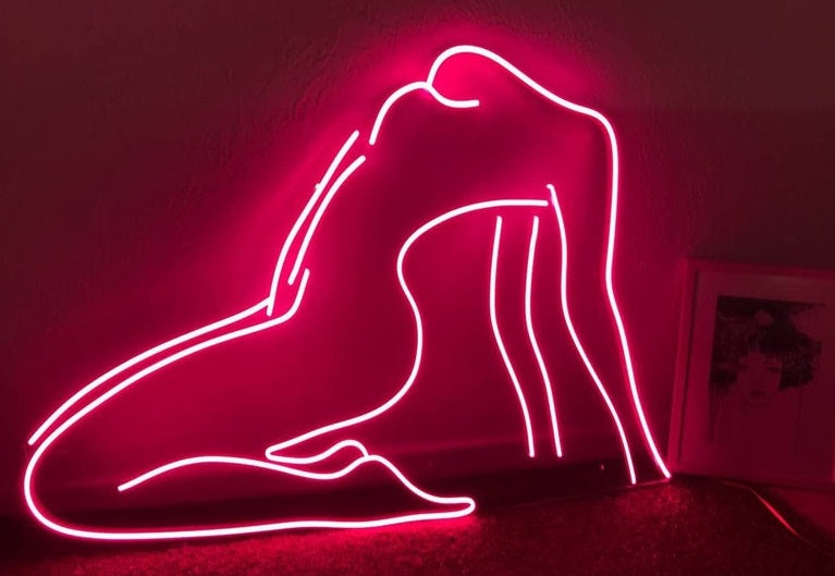Neon sign a beautiful woman's body